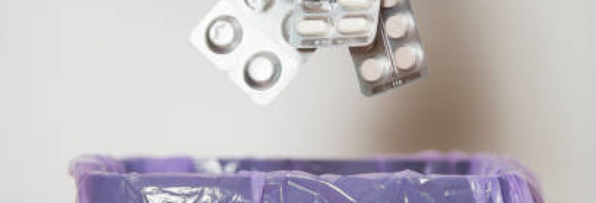 What is the correct method of disposing of unwanted medications?
